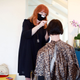 Salon owner and stylist Kari Kinney works with customer Sadie Frazier during a styling appointment at Shampoo Salon on May 8, 2020, in Fort Worth, Texas. Texas Governor Greg Abbott announced hair salons, barbershops and tanning salons were allowed to open on Friday amid the coronavirus (COVID-19) pandemic.